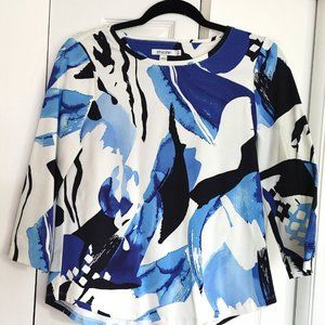 Chicos pull over top